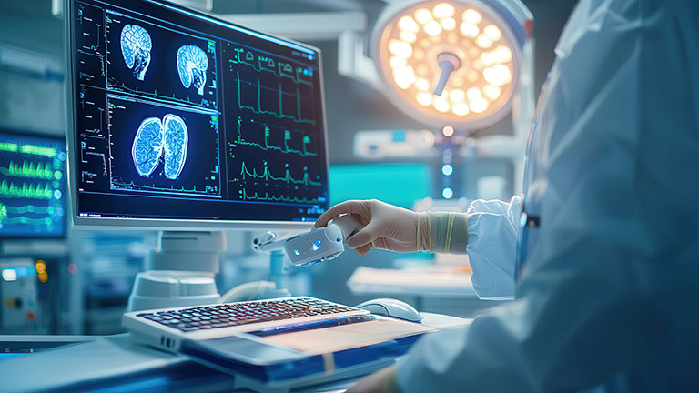 helthcare worker looking a brain imaging